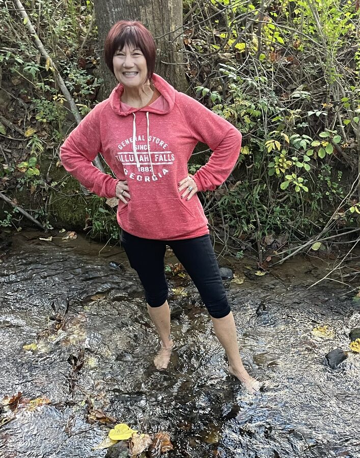 Tammy C., MyGevity member, outdoors in a park